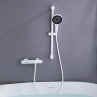 Witte thermostatische badkraan met handdouche en glijstang