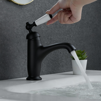 Zwarte nostalgische wastafelkraan met keramische hendel