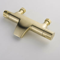 Geborsteld gouden thermostatische badkraan