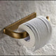 bronze-colored toilet roll holder
