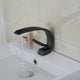 Modern stylish oil bronze washbasin tap curved model
